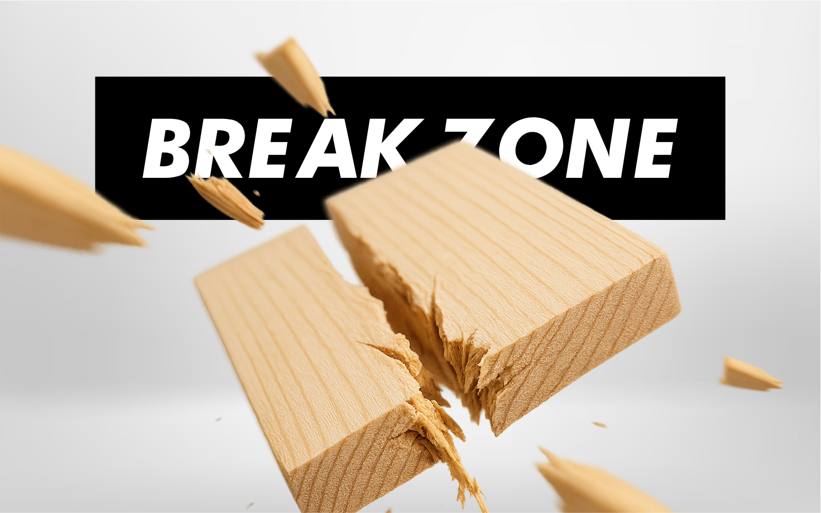 Bold black banner reading BREAK ZONE with large white letters, wooden blocks shattering in midair in a white/gray background.